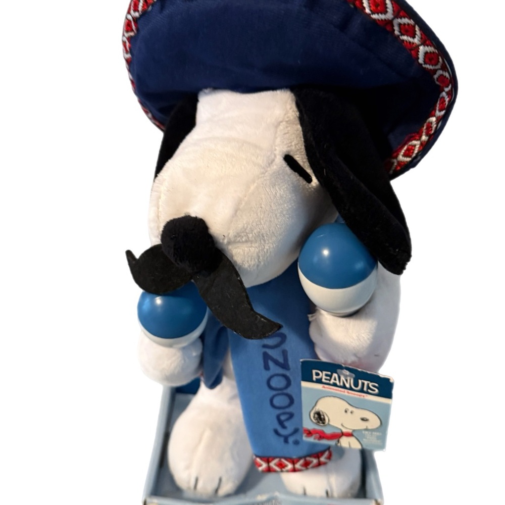 Peanuts Animated Snoopy Plush with Sombrero plays Feliz Navidad